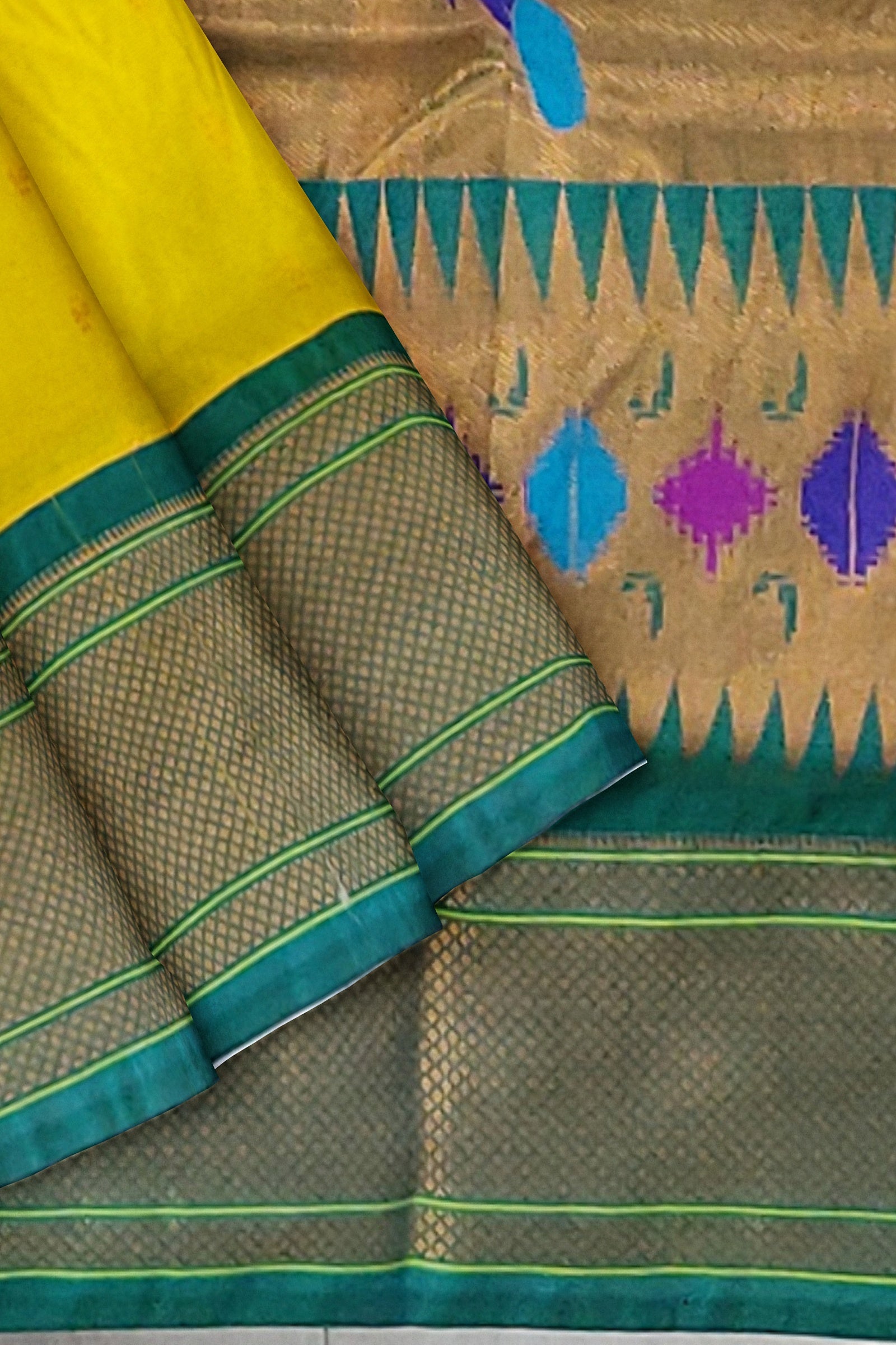SEMI SILK: A cheerful lemon-colored Paithani saree