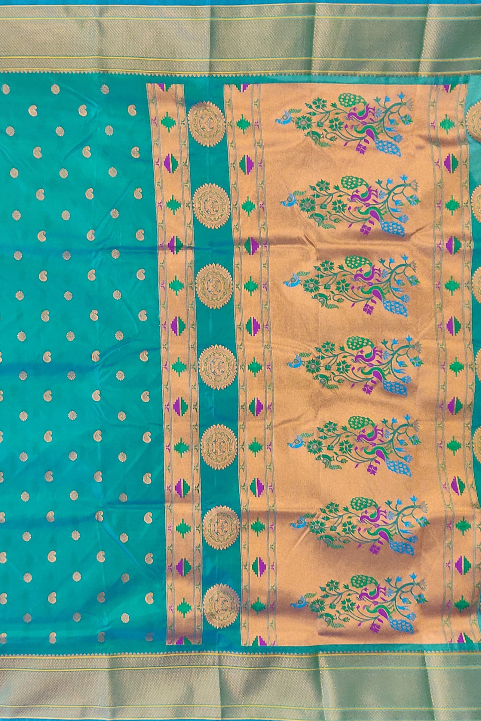 SEMI SILK: Stunning peacock-colored self Paithani saree
